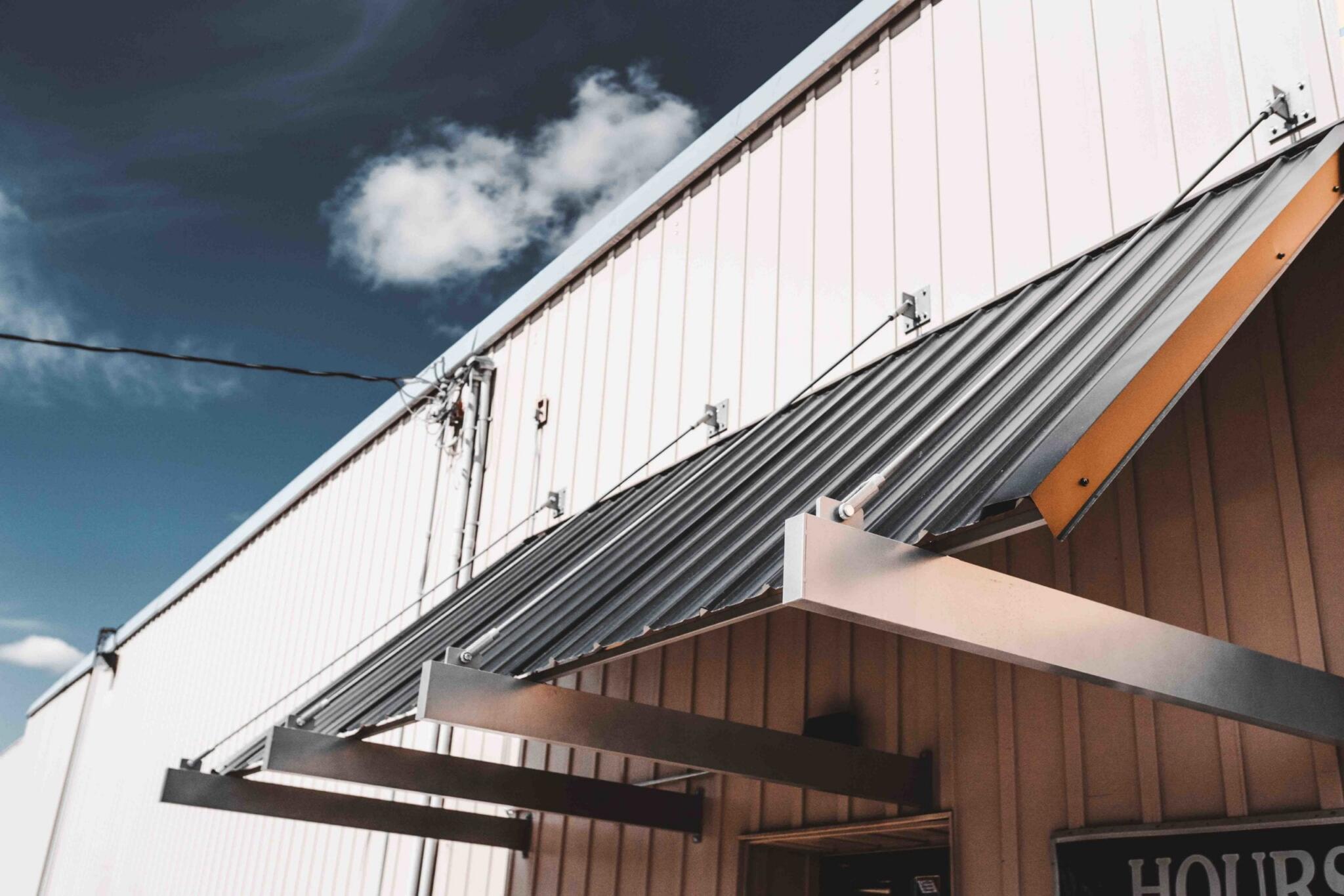 concrete building with louvered sunshades 