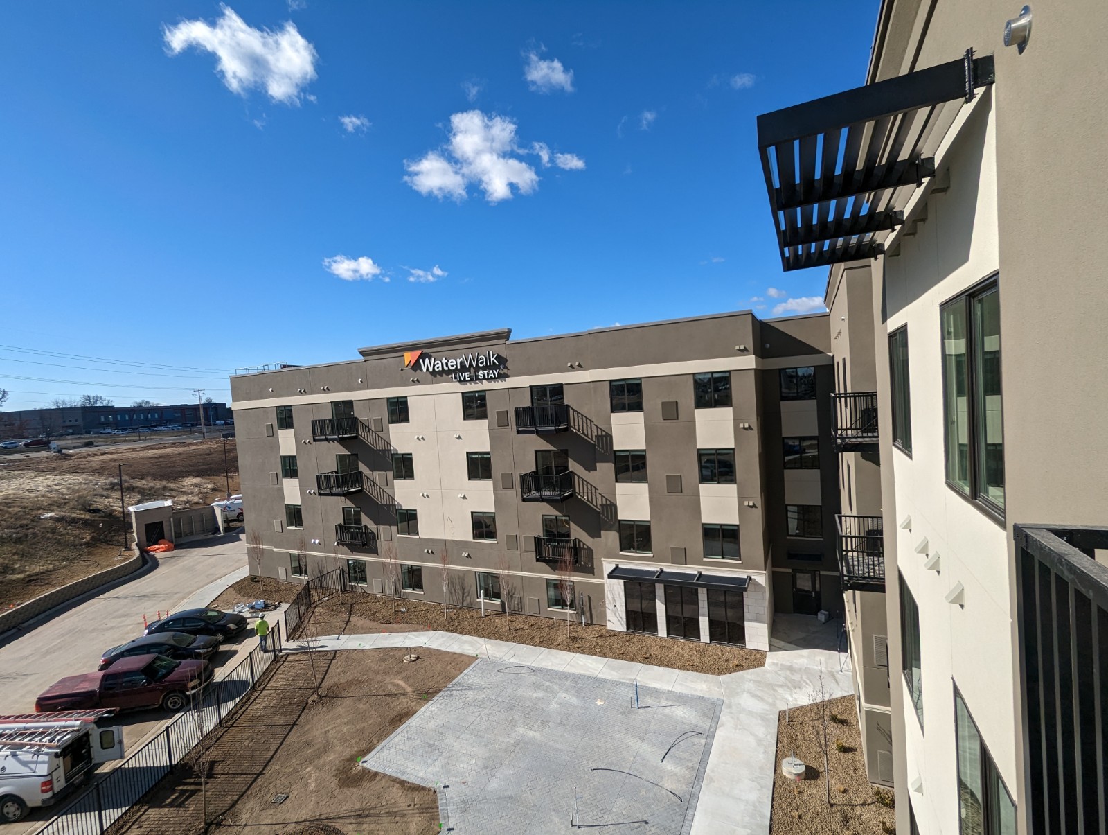 concrete building with louvered sunshades